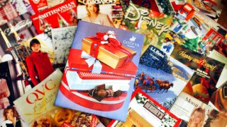 FILE – This Wednesday, Nov. 24, 2004 file photo shows a selection of holiday season catalogs in Portland, Maine. Catalogs, those glossy paper-and-ink offerings of outdoor apparel, kitchenware and fruit baskets, are not yet headed for the recycling bin of history. (AP Photo/Robert F. Bukaty, File)