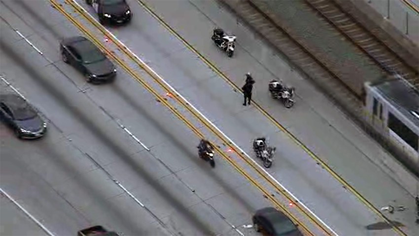 Motorcycle Officer Struck In Hit And Run Freeway Crash Nbc Los Angeles