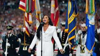 Demi Lovato performs the national anthem before the NFL Super Bowl 54 football game between the San Francisco 49ers and the Kansas City Chiefs Sunday, Feb. 2, 2020, in Miami Gardens, Fla.