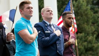 In this Sept. 11, 2015, file photo, Oregon National Guardsman Alek Skarlatos, left, U.S. Airman Spencer Stone, center, and Anthony Sadler attend a parade held to honor the three Americans who stopped a gunman on a Paris-bound passenger train, in Sacramento, California.