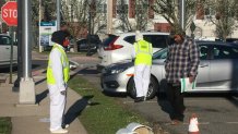 Members of the organization Wind of the Spirit help day laborers in New Jersey to protect themselves from the coronavirus.