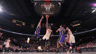 PORTLAND, OR – DECEMBER 6: Damian Lillard #0 of the Portland Trail Blazers shoots the ball against the Los Angeles Lakers on December 6, 2019 at the Moda Center Arena in Portland, Oregon. NOTE TO USER: User expressly acknowledges and agrees that, by downloading and or using this photograph, user is consenting to the terms and conditions of the Getty Images License Agreement. Mandatory Copyright Notice: Copyright 2019 NBAE (Photo by Sam Forencich/NBAE via Getty Images)