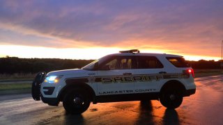 sheriff's vehicle at sunset