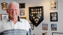 Former New York Yankees pitcher Don Larsen stands in his memorabilia room, Wednesday, Aug. 2, 2006, at his home in Hayden Lake, Idaho.