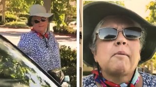 woman in hat and woman near car