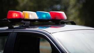 Close up of lights on a black police car.