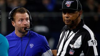 Los Angeles Rams head coach Sean McVay, left, talks with an official in the second half of an NFL football game against the Dallas Cowboys in Arlington, Texas, Sunday, Dec. 15, 2019.