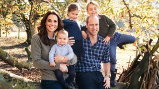This file photo released by Kensington Palace on Friday Dec. 14, 2018, shows the photo taken by Matt Porteous of Britain's Prince William and Kate, Duchess of Cambridge with their children Prince George, right, Princess Charlotte, center, and Prince Louis at Anmer Hall in Norfolk, east England, which is to be used as their 2018 Christmas card.