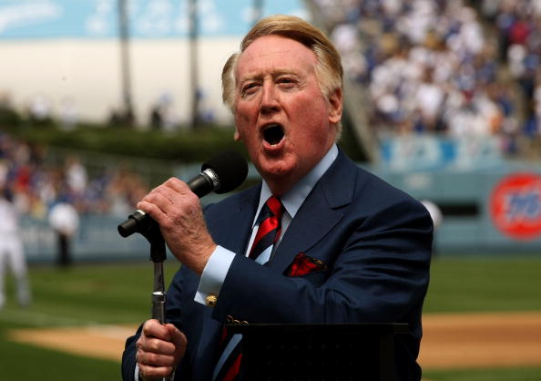 Dodgers broadcaster Vin Skully gives the call of "It's time for Dodger baseball!" during pregame ceremonies for the Los Angeles Dodgers home opener against the San Francisco Giants on April 13, 2009 at Dodger Stadium in Los Angeles, Calif.