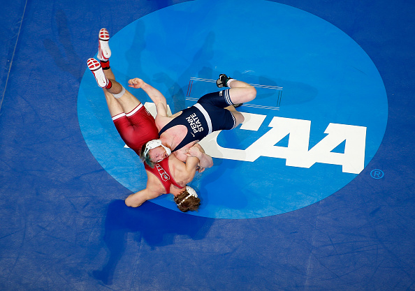 Bo Nickal of the Penn State Nittany Lions attempts a body slam of Nathan Traxler of the Stanford Cardinal in the 197 lbs weight class quarterfinals during the Division I Men's Wrestling Championship