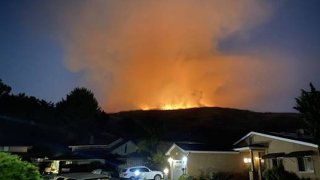 An orange glow from a brush fire in the Whittier area is pictured Thursday June 4, 2020.