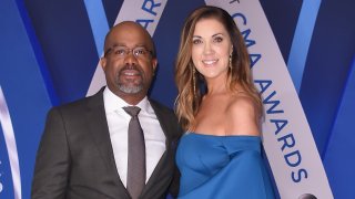 In this Nov. 8, 2017, file photo, musical artist Darius Rucker and wife Beth Leonard attend the 51st annual CMA Awards at the Bridgestone Arena in Nashville, Tennessee.