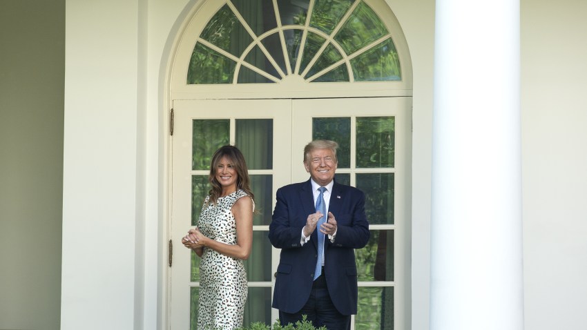 U.S. President Donald Trump and First Lady Melania Trump, left, exit after a Presidential Recognition Ceremony in the Rose Garden of the White House in Washington, D.C., U.S., on Friday, May 15, 2020.