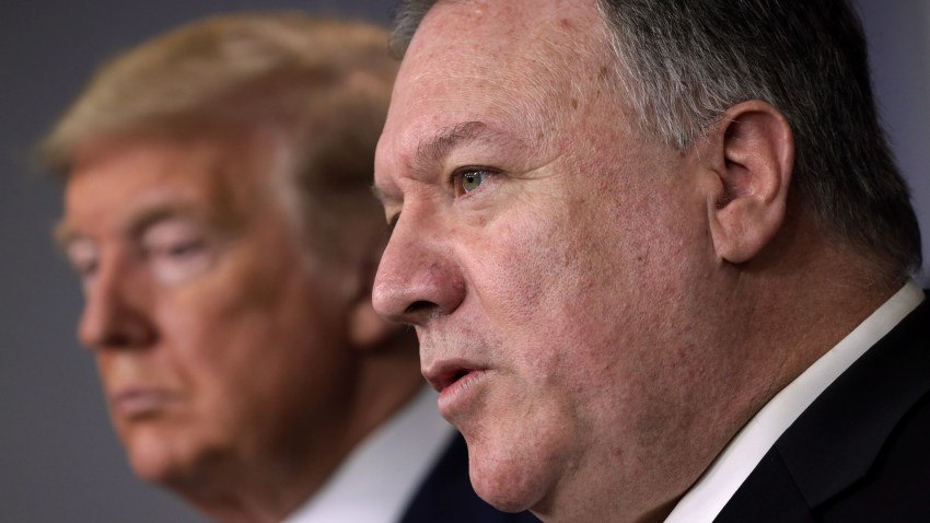 Secretary of State Mike Pompeo speaks as President Donald Trump listens during a news briefing on the latest development of the coronavirus outbreak in the U.S. at the James Brady Press Briefing Room at the White House March 20, 2020 in Washington, DC. With deaths caused by the coronavirus rising and foreseeable economic turmoil, the Senate is working on legislation for a $1 trillion aid package to deal with the COVID-19 pandemic. President Trump announced that tax day will be delayed from April 15 to July 15.