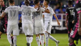 LAFC players celebrate with Los Angeles FC forward Diego Rossi (9) after he scored goal on a penalty kick during the soccer match between the Seattle Sounders and the Los Angeles Football Club on July 27, 2020, at ESPN Wide World of Sports Complex in Orlando, FL. (Photo by Joe Petro/Icon Sportswire via Getty Images)