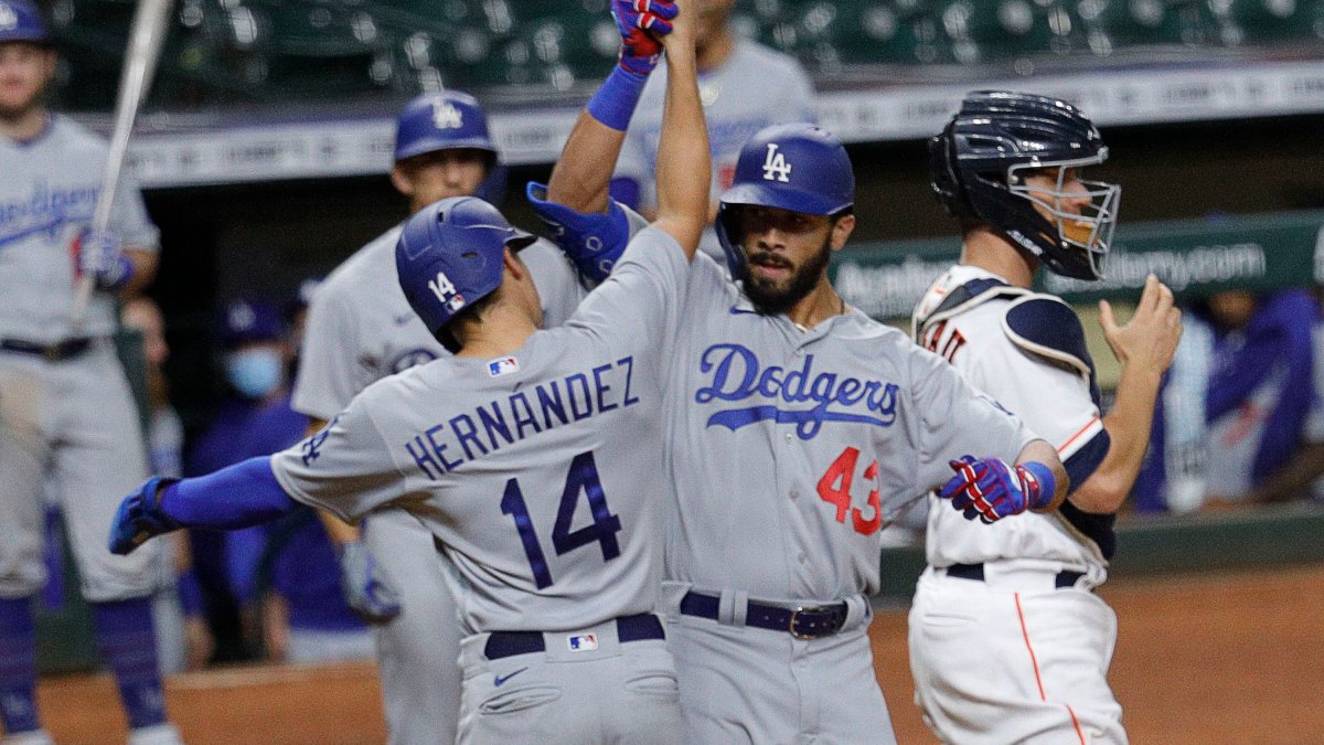 Los Angeles Dodgers' Edwin Rios, right, celebrates with Corey