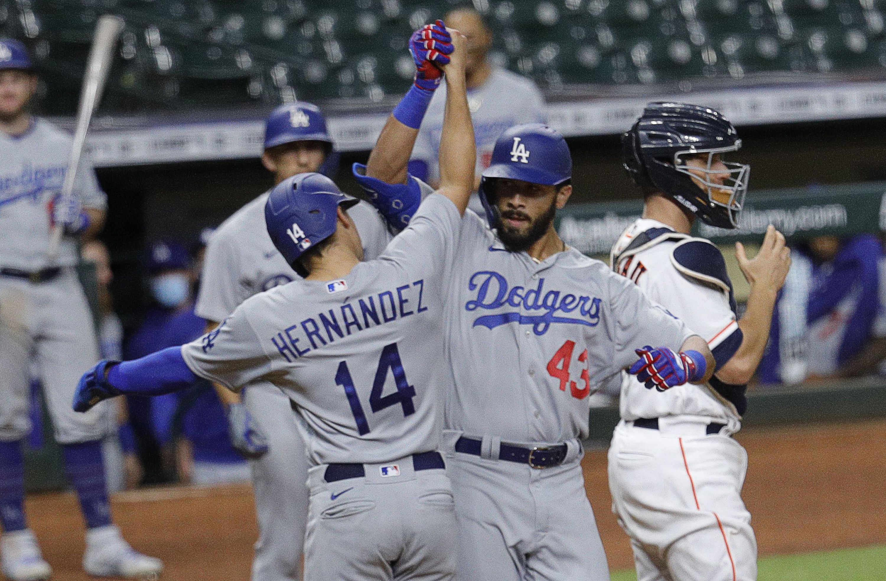 Los Angeles Dodgers designated hitter Edwin Rios (43) hits a home run  during an MLB regular season game against the Atlanta Braves, Wednesday,  April 2 Stock Photo - Alamy