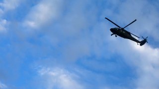 A US Army Sikorsky UH 60 Black Hawk helicopter flies over Kabul.