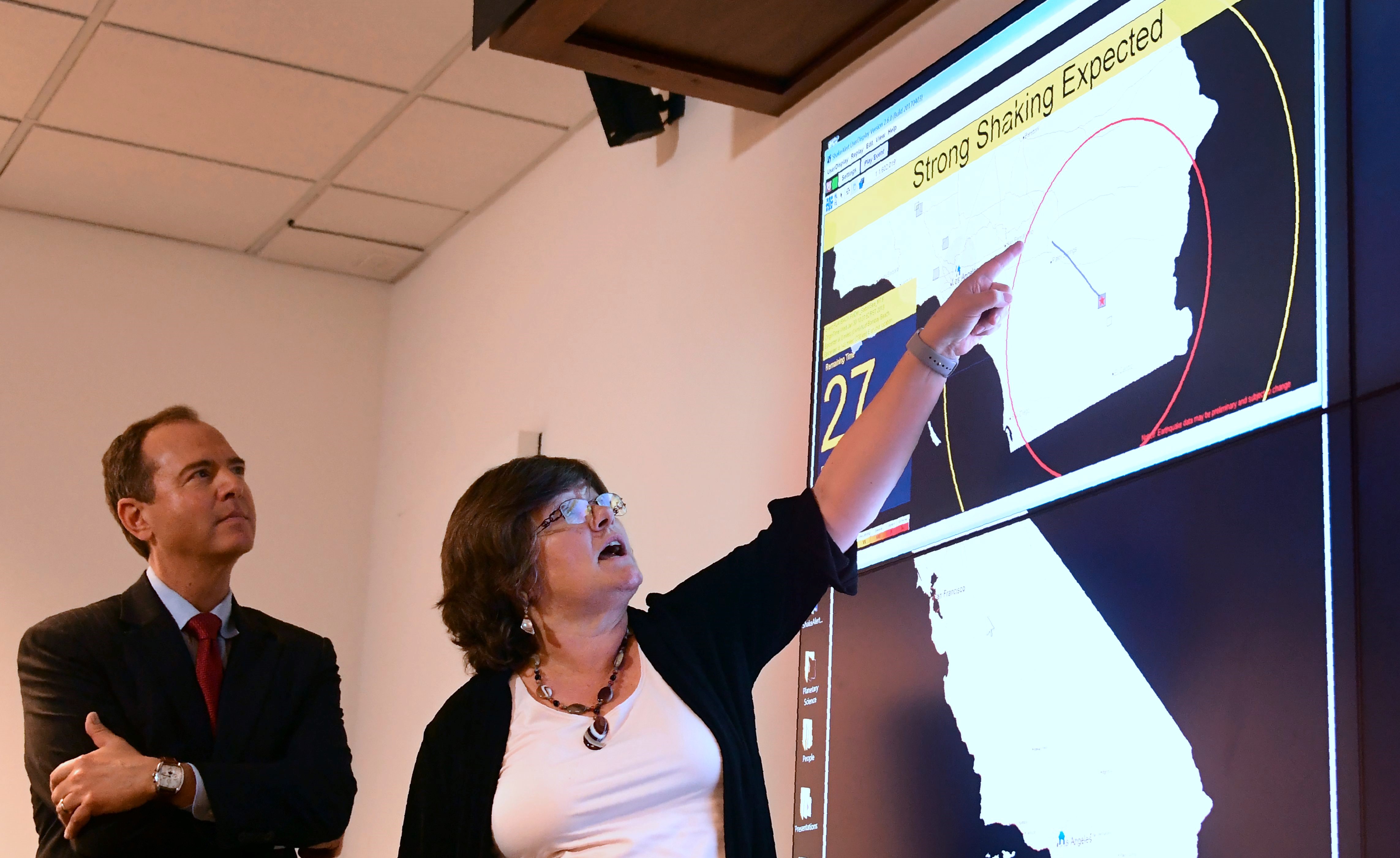 Dr. Lucy Jones speaks as Rep. Adam Schiff (D-Burbank) watches on June 1, 2017 at the Caltech Seismological Laboratory media center in Pasadena, California, where they addressed the elimination of federal funding for the West Coast Earthquake early Warning system, also known as ShakeAlert, in President Trump’s FY2018 budget. / AFP PHOTO / FREDERIC J. BROWN        (Photo credit should read FREDERIC J. BROWN/AFP via Getty Images)