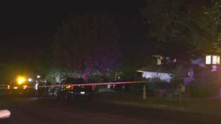 Police at the scene of a shooting in Encino.