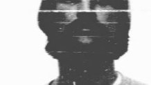 Suspect Johnny Chrisco in a 1971 booking photo.