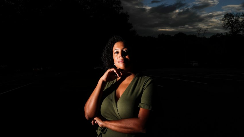 In this July 24, 2020, file photo, Charisse Davis poses for a portrait in Marietta, Ga. Davis was recently elected the only Black woman on the Cobb County School Board. "We've been watching from the sidelines and allowing other people to take their turns, and take these positions of power," Davis said. "Now here we are to essentially fix it."