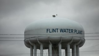 The Flint Water Plant tower stands in Flint, Michigan, U.S., on April 13, 2020. On Monday, Covid-19 cases reached 25,635 in Michigan, according to data from the state health department.