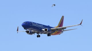 A Southwest Airlines jet comes in for a landing at McCarran International Airport on May 25, 2020 in Las Vegas, Nevada.