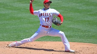 Shohei Ohtani #17 of the Los Angeles Angels pitches in the second inning of the game against the Houston Astros at Angel Stadium of Anaheim on August 2, 2020 in Anaheim, California.
