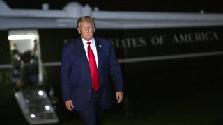 U.S. President Donald Trump walks on the South Lawn of the White House after arriving on Marine One in Washington, D.C., U.S., on Sunday, Aug. 9, 2020.