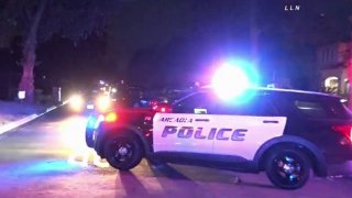 A police SUV at the scene of a shooting.