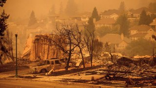 Homes leveled by the Glass Fire line a street in the Skyhawk neighborhood of Santa Rosa, Calif., Sept. 28, 2020.