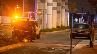 Deputies at the scene of a shooting in Compton.