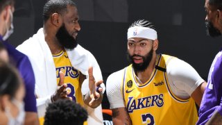 LeBron James #23 talks with Anthony Davis #3 of the Los Angeles Lakers during Game One of the Western Conference Finals of the NBA Playoffs on September 18, 2020 at AdventHealth Arena in Orlando, Florida.