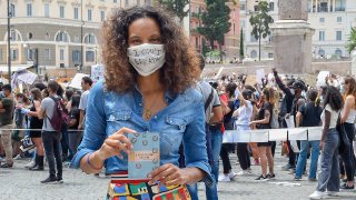 In this June 7, 2020, file photo, Stella Jean, the first Italian Black designer, is seen at the Black Lives Matter protest in Piazza del Popolo in Italy.