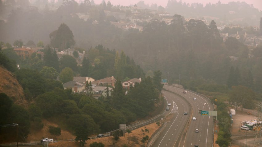 OAKLAND, CA – SEPT. 10: Traffic rolls through smoky conditions on Highway 13 in Oakland, Calif. on Thursday, Sept. 10, 2020. The orange hue of the sky is gone but smoke from wildfires burning in Northern California and the Pacific Northwest continue to foul the air quality in the region. (Paul Chinn/The San Francisco Chronicle via Getty Images)