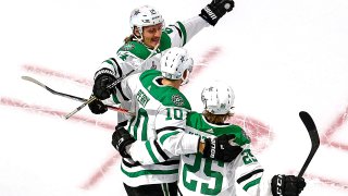 Joel Kiviranta #25 of the Dallas Stars is congratulated by Corey Perry #10 after scoring a goal against the Tampa Bay Lightning during the second period in Game One of the 2020 NHL Stanley Cup Final at Rogers Place on September 19, 2020 in Edmonton, Alberta, Canada. (Photo by Bruce Bennett/Getty Images)