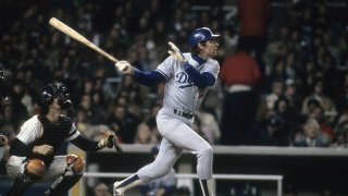 Outfielder Jay Johnstone #21 of the Los Angeles Dodgers swings and watches the flight of his ball during the World Series at Yankee Stadium in October 1981 in Bronx, New York. The Dodgers won the series 4-2. (Photo by Focus on Sport/Getty Images)