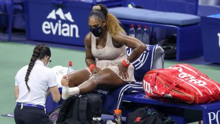 Serena Williams of the United States has her ankle retaped in the third set during her Women's Singles semifinal match against Victoria Azarenka of Belarus on Day Eleven of the 2020 US Open at the USTA Billie Jean King National Tennis Center on September 10, 2020, in the Queens borough of New York City.
