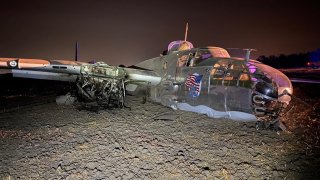A World War II-era plane after it crashed in a field in central California.