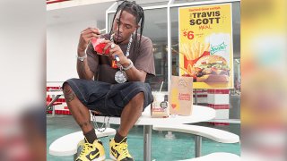 Travis Scott eating fries at McDonald's