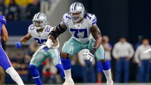 Dallas Cowboys Offensive Tackle Tyron Smith (77) pass blocks during the game between the Buffalo Bills and Dallas Cowboys on Nov. 28, 2019 at AT&T Stadium in Arlington, Texas.