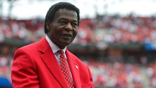 In this April 13, 2015, file photo, St. Louis Cardinals hall of famer Lou Brock looks on during the opening day ceremony before a game against the Milwaukee Brewers at Busch Stadium in St. Louis, Missouri. Brock died Sept. 6 at the age of 81.