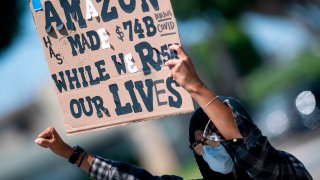 Workers protest against the failure from their employers to provide adequate protections in the workplace of the Amazon delivery hub