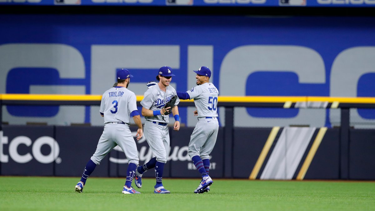 Los Angeles Dodgers celebrate in the lockerroom after beating the Atlanta  Braves in Game 4 of the National League Division Series at Dodger Stadium  in Los Angeles on October 7, 2013. The