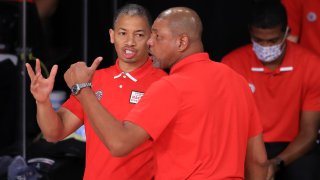 File Image: Assistant coach for the LA Clippers Tyronn Lue talks with Doc Rivers of the LA Clippers during the fourth quarter against the Denver Nuggets in Game Six of the Western Conference Second Round during the 2020 NBA Playoffs at AdventHealth Arena at the ESPN Wide World Of Sports Complex on September 12, 2020 in Lake Buena Vista, Florida.