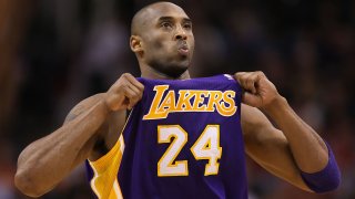 PHOENIX, AZ – FEBRUARY 19: Kobe Bryant #24 of the Los Angeles Lakers adjusts his jersey during the NBA game against the Phoenix Suns at US Airways Center on February 19, 2012 in Phoenix, Arizona. (Photo by Christian Petersen/Getty Images)