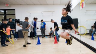 Participants attend a family event with Pau Gasol at Weingart East Los Angeles YMCA on April 2, 2018.