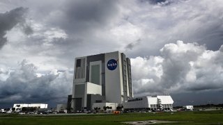 Storms clouds move into the area of Launch Complex 39-A at Kennedy Space Center, Fla., Wednesday, July 8, 2020. SpaceX Falcon 9 was scheduled to lift-off at 11:54 on the Starlink-9 mission, the 10th flight in building the Starlink satellite constellation.