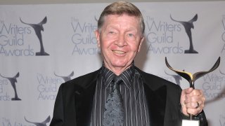 In this Feb. 7, 2009, file photo, writer William Blinn, winner of the Paddy Chayefsky Laurel Award, poses at the 2009 Writers Guild Awards press room at the Hyatt Regency Century Plaza Hotel in Los Angeles, California.